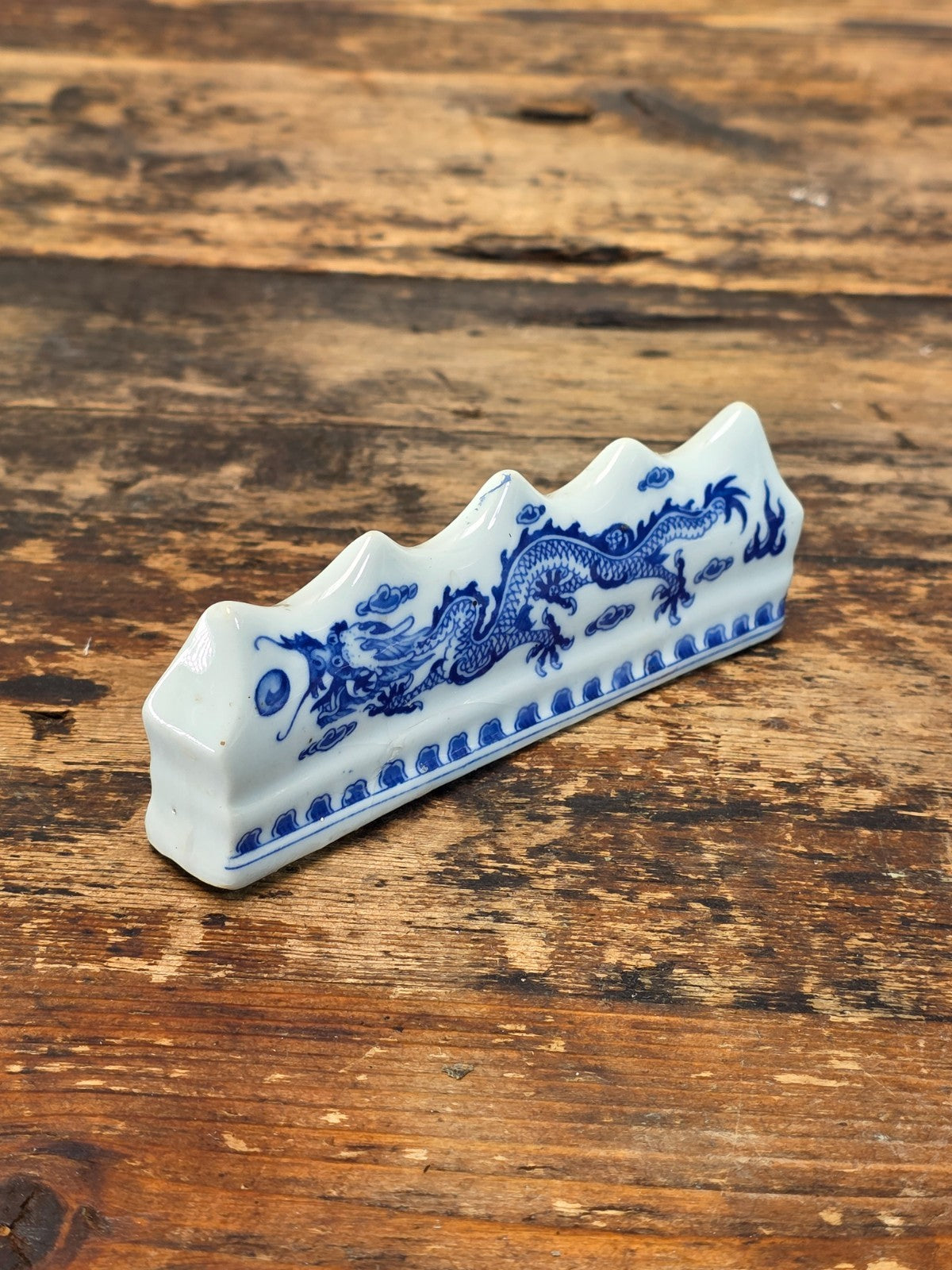 Blue and White Porcelain Brush Rest with Dragon Design