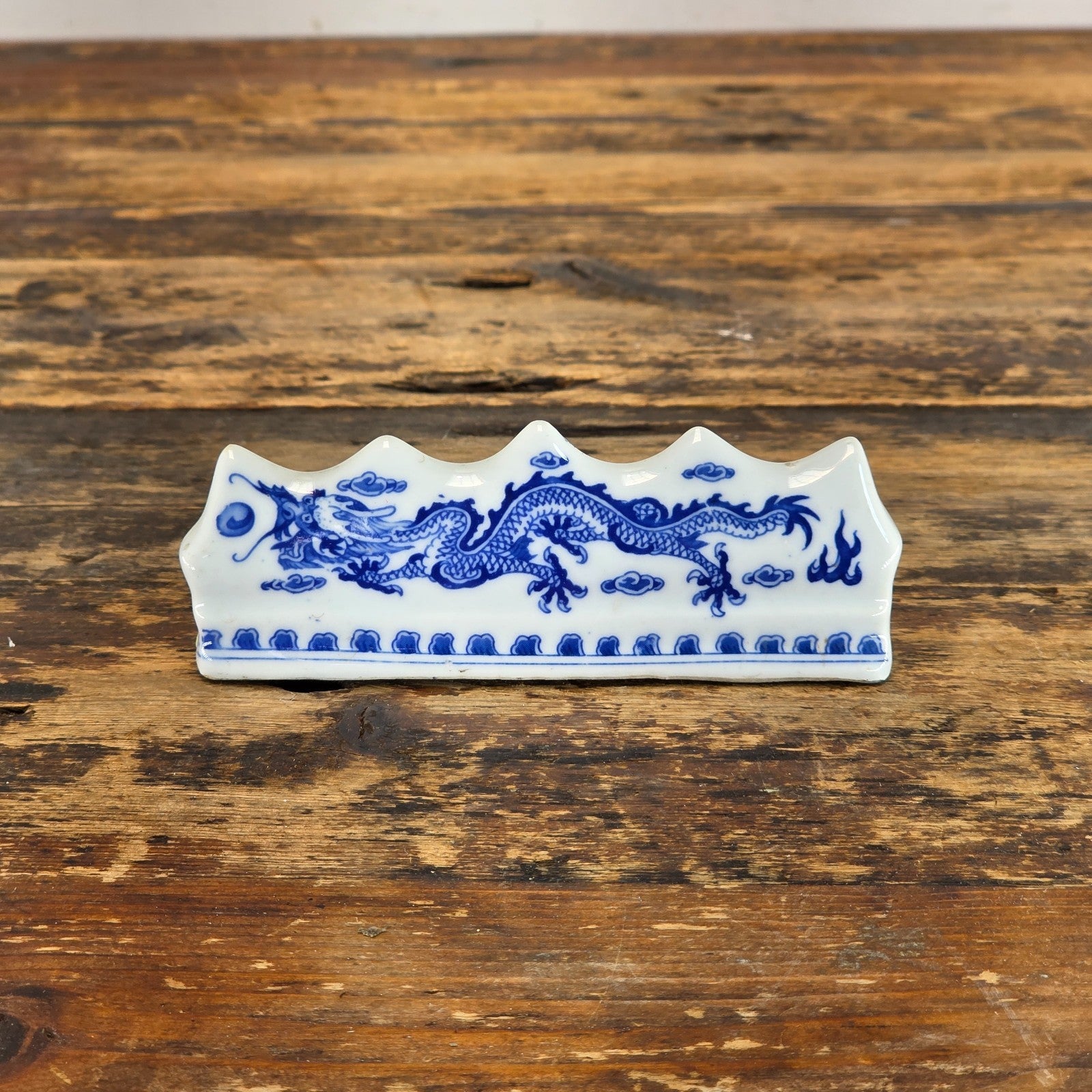 Blue and White Porcelain Brush Rest with Dragon Design