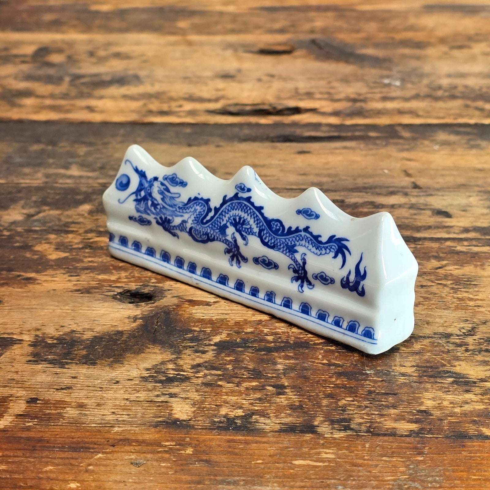 Blue and White Porcelain Brush Rest with Dragon Design