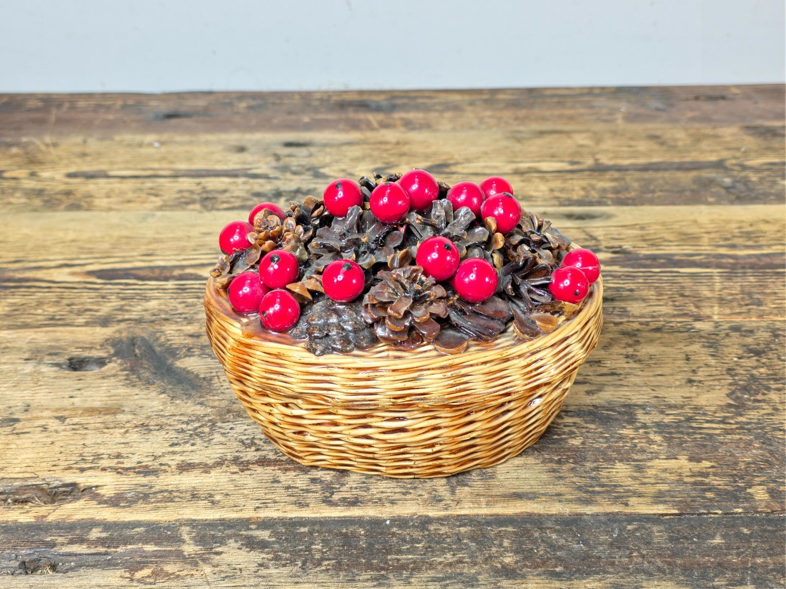 Vintage Resin Coated Wicker Basket with Pinecones and Red Berries Lid