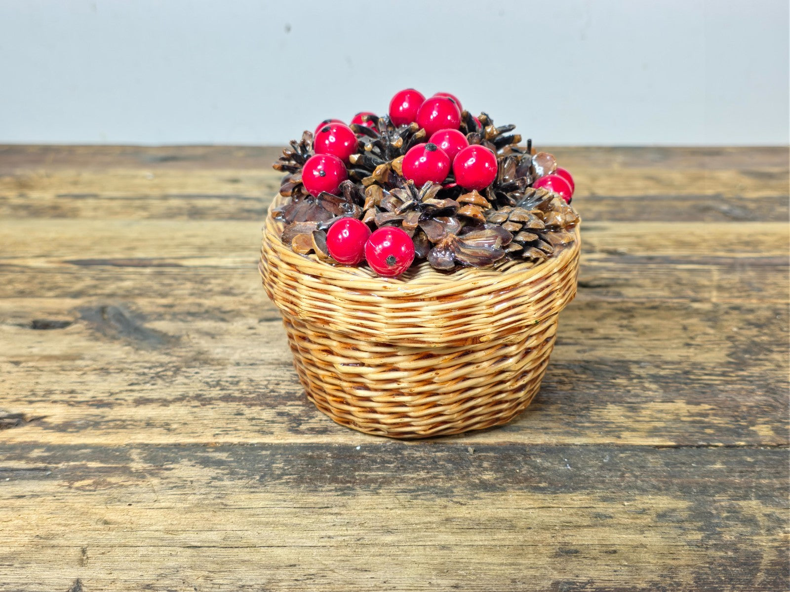 Vintage Resin Coated Wicker Basket with Pinecones and Red Berries Lid