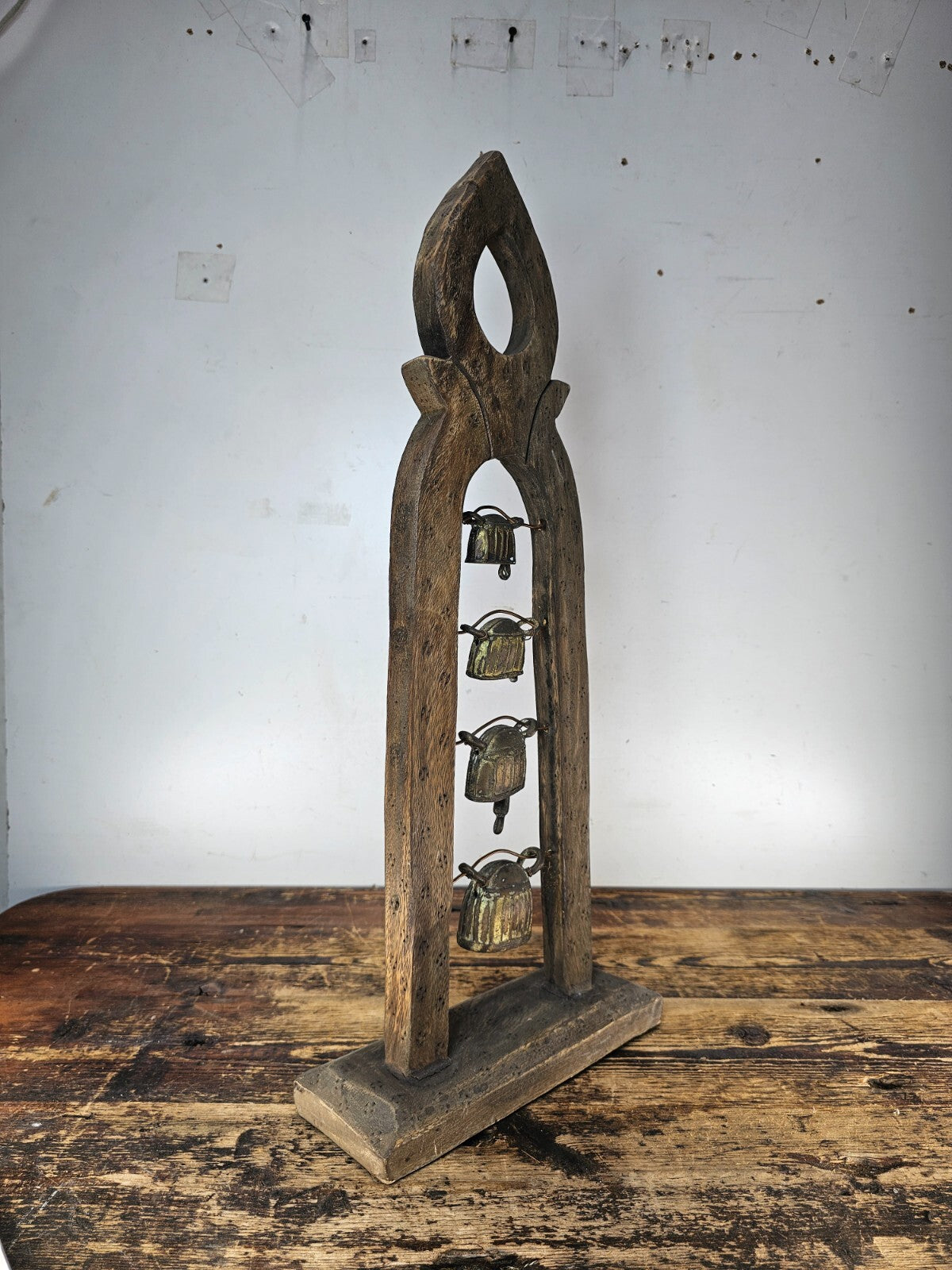 Four Burmese Hka-Lauk Water Buffalo Bells on Wooden Stand 23"H