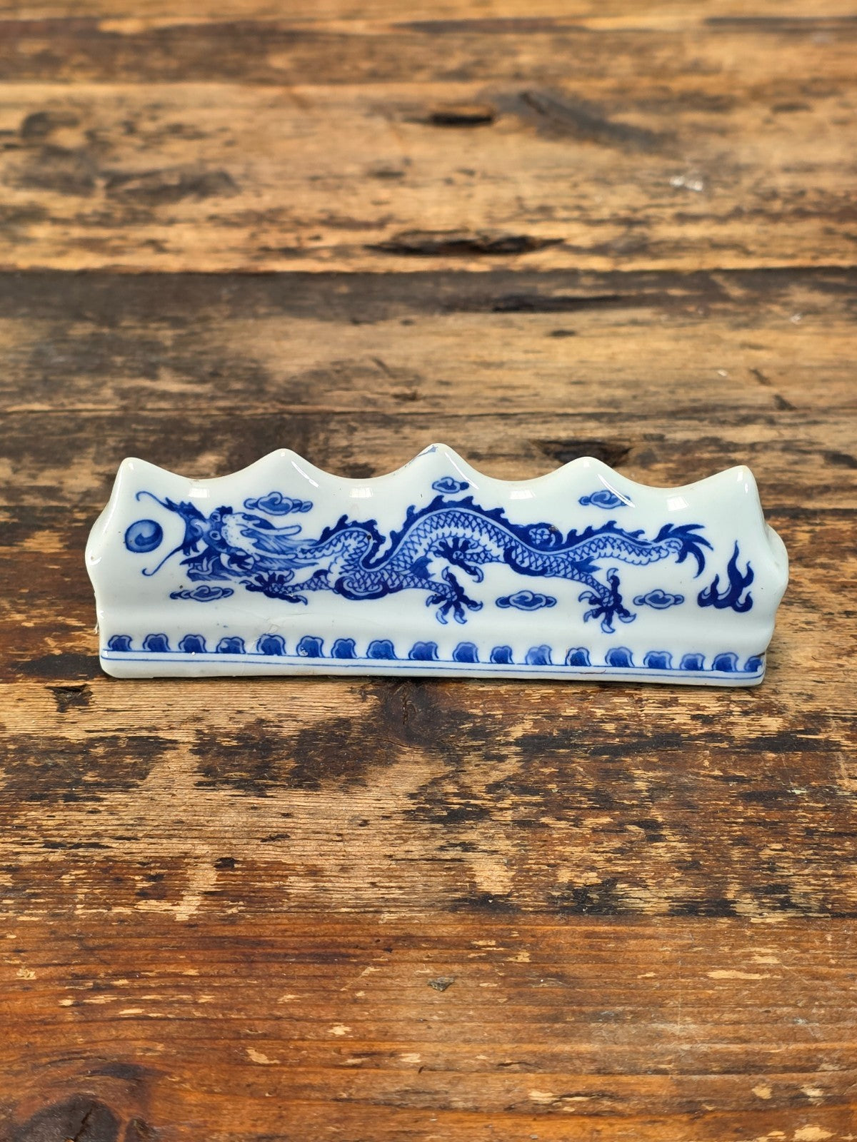 Blue and White Porcelain Brush Rest with Dragon Design