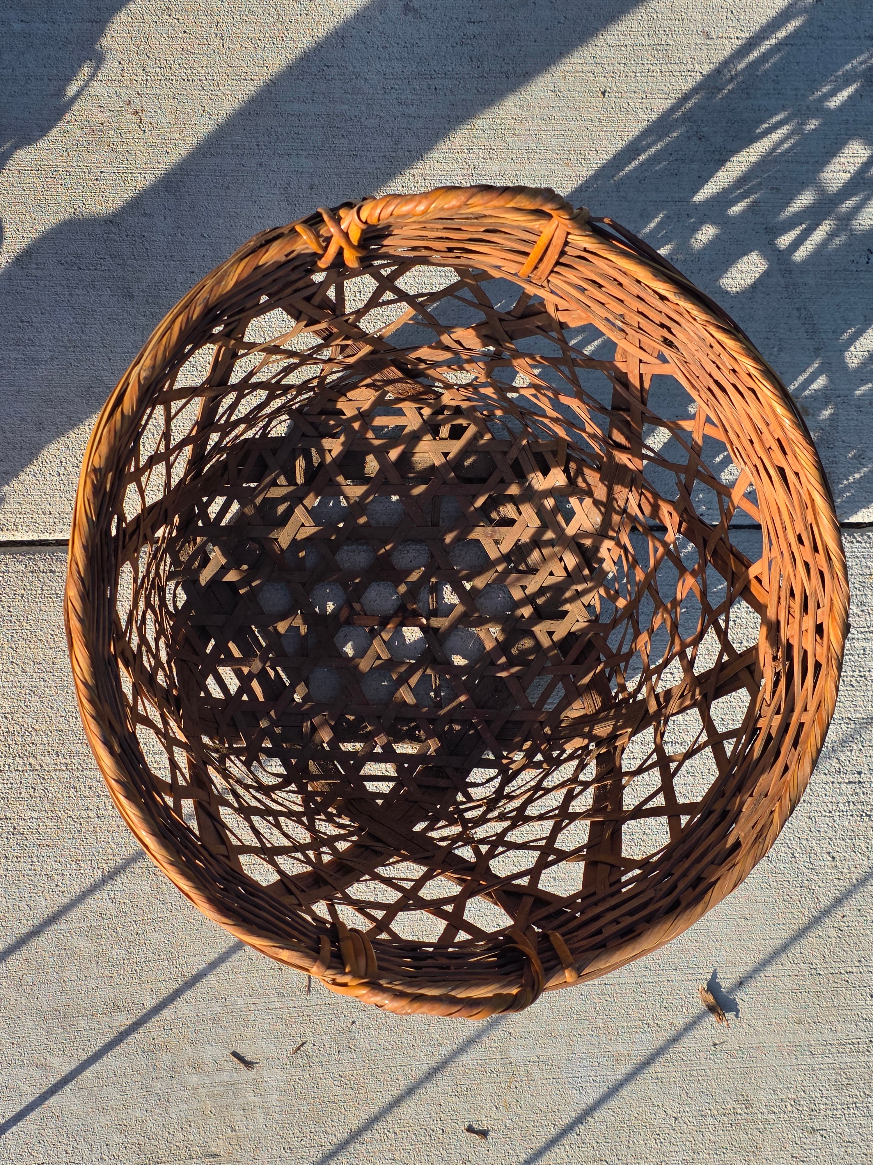 Vintage Boho Bamboo & Rattan Basket with Mid-Century Modern Iron Wire Stand
