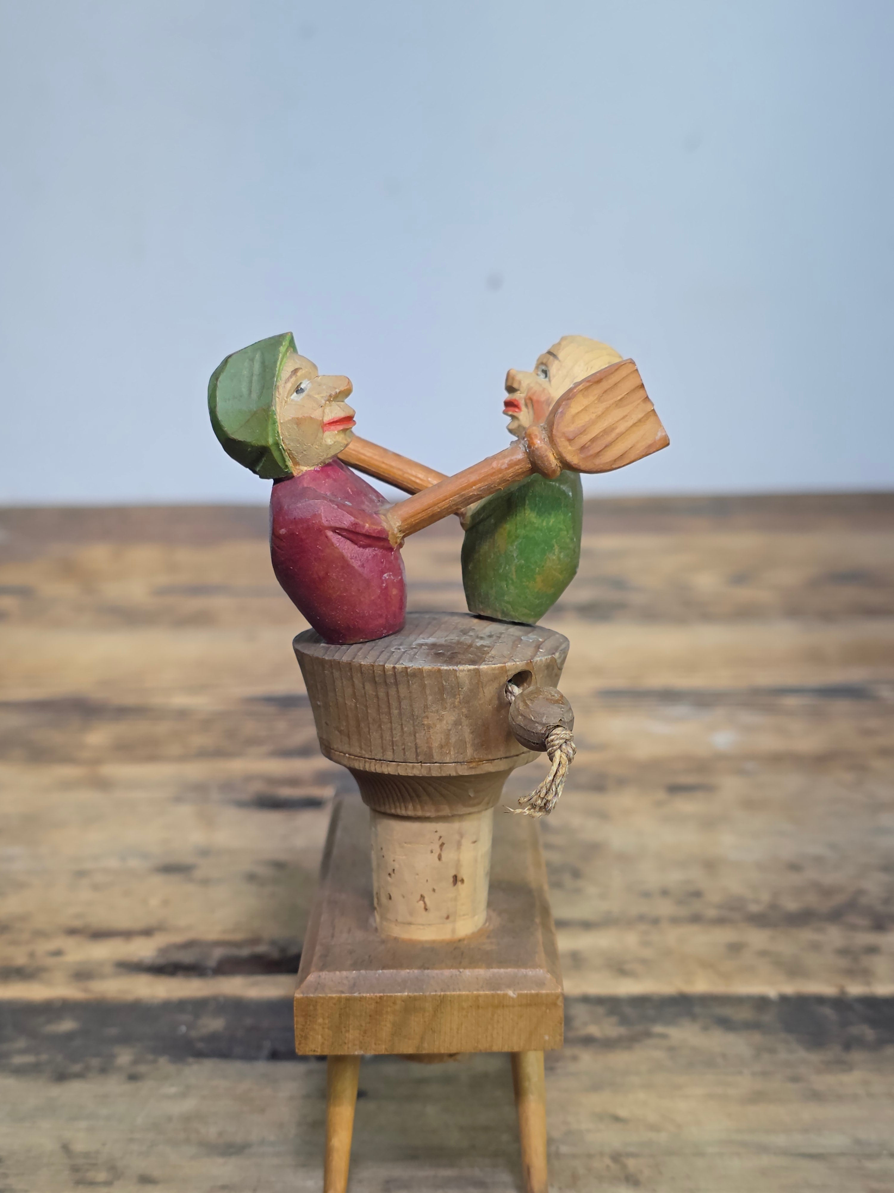 Vintage ANRI Wood Carved Mechanical Bottle Stopper Fighting Couple Brooms