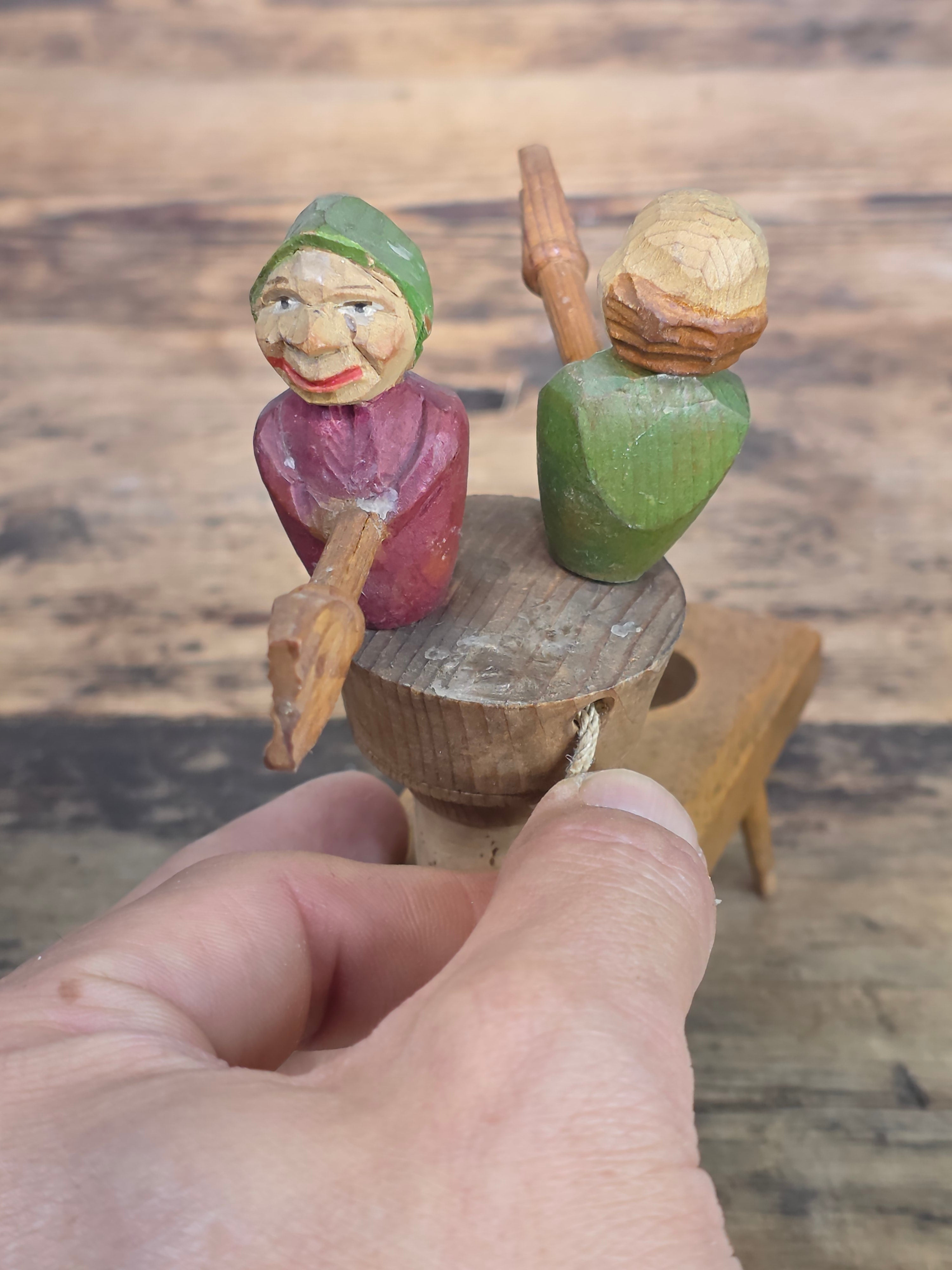 Vintage ANRI Wood Carved Mechanical Bottle Stopper Fighting Couple Brooms