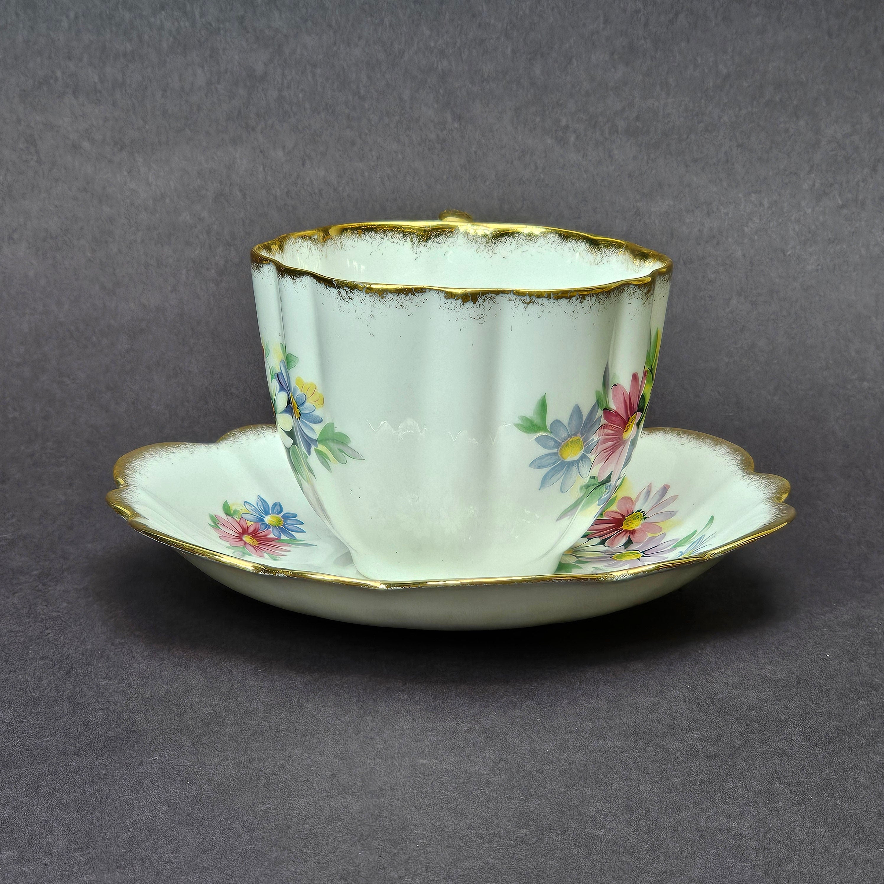 Vintage Taylor and Kent Gold Trim Teacup & Saucer Set From England