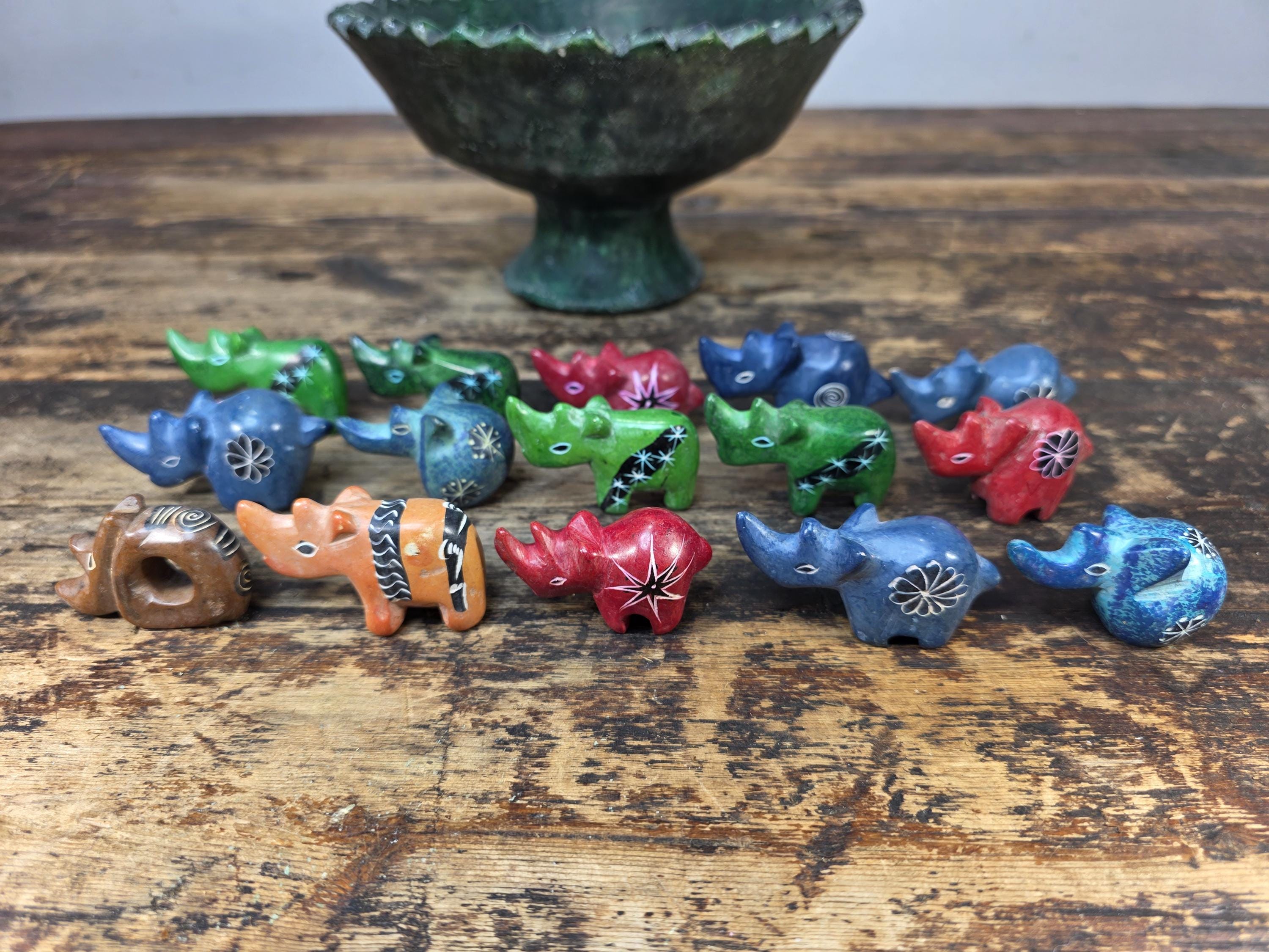 Tamegroute Green Pedestal Bowl with 15 African Soapstone Rhino Figurines