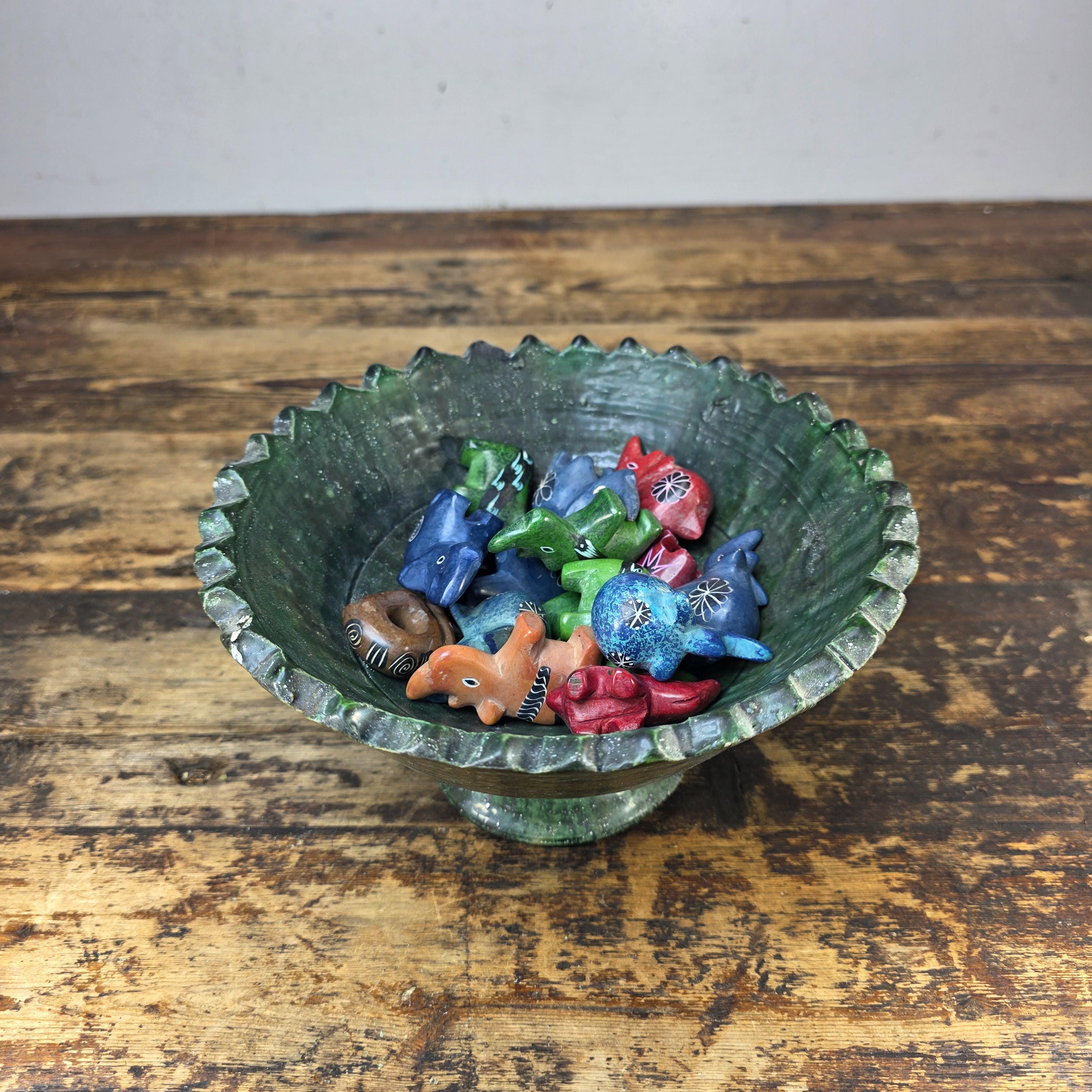 Tamegroute Green Pedestal Bowl with 15 African Soapstone Rhino Figurines