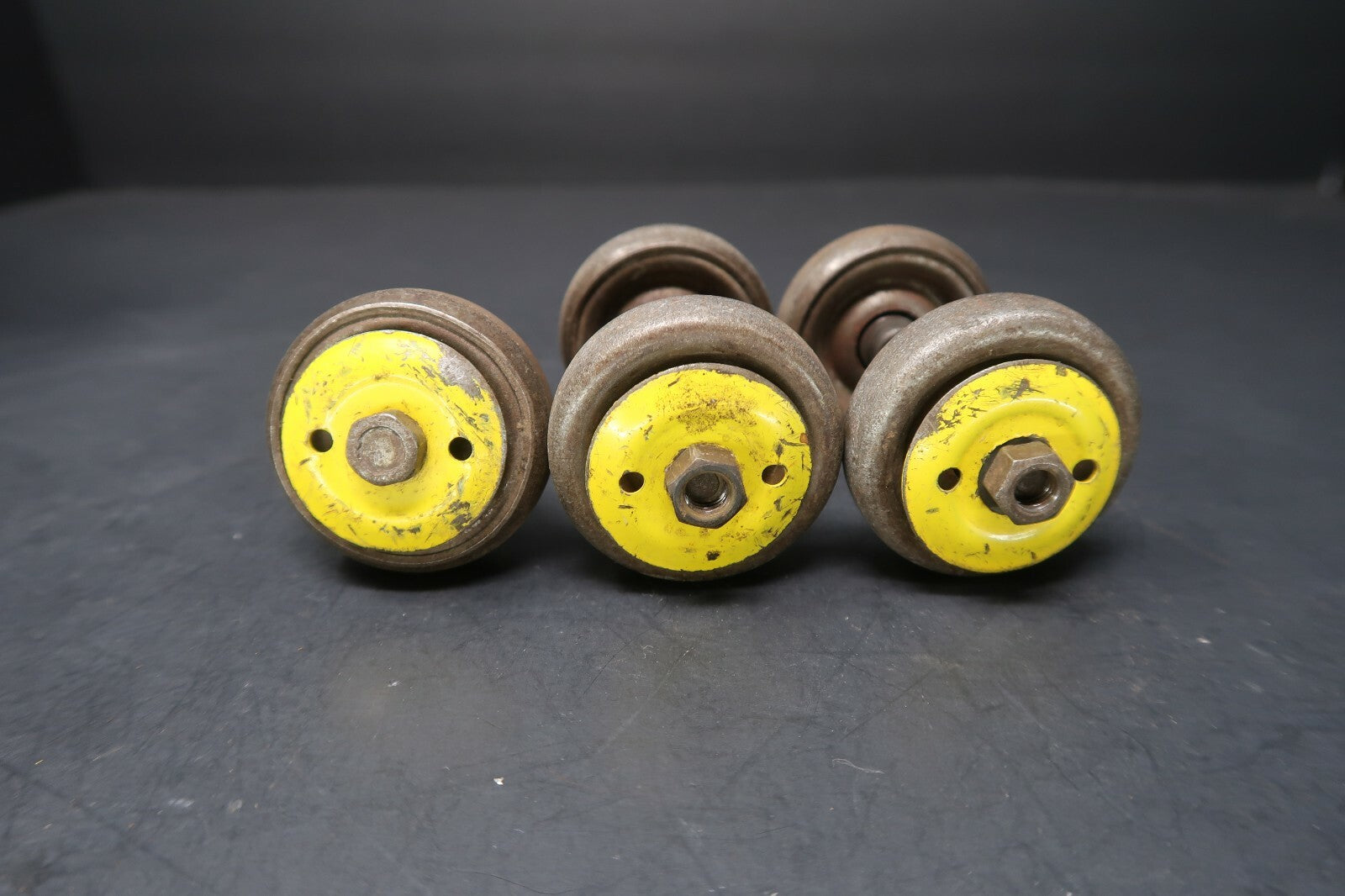 Lot of 5  Vintage Iron Ball Bearing Casters Wheels With Yellow Wheel Covers