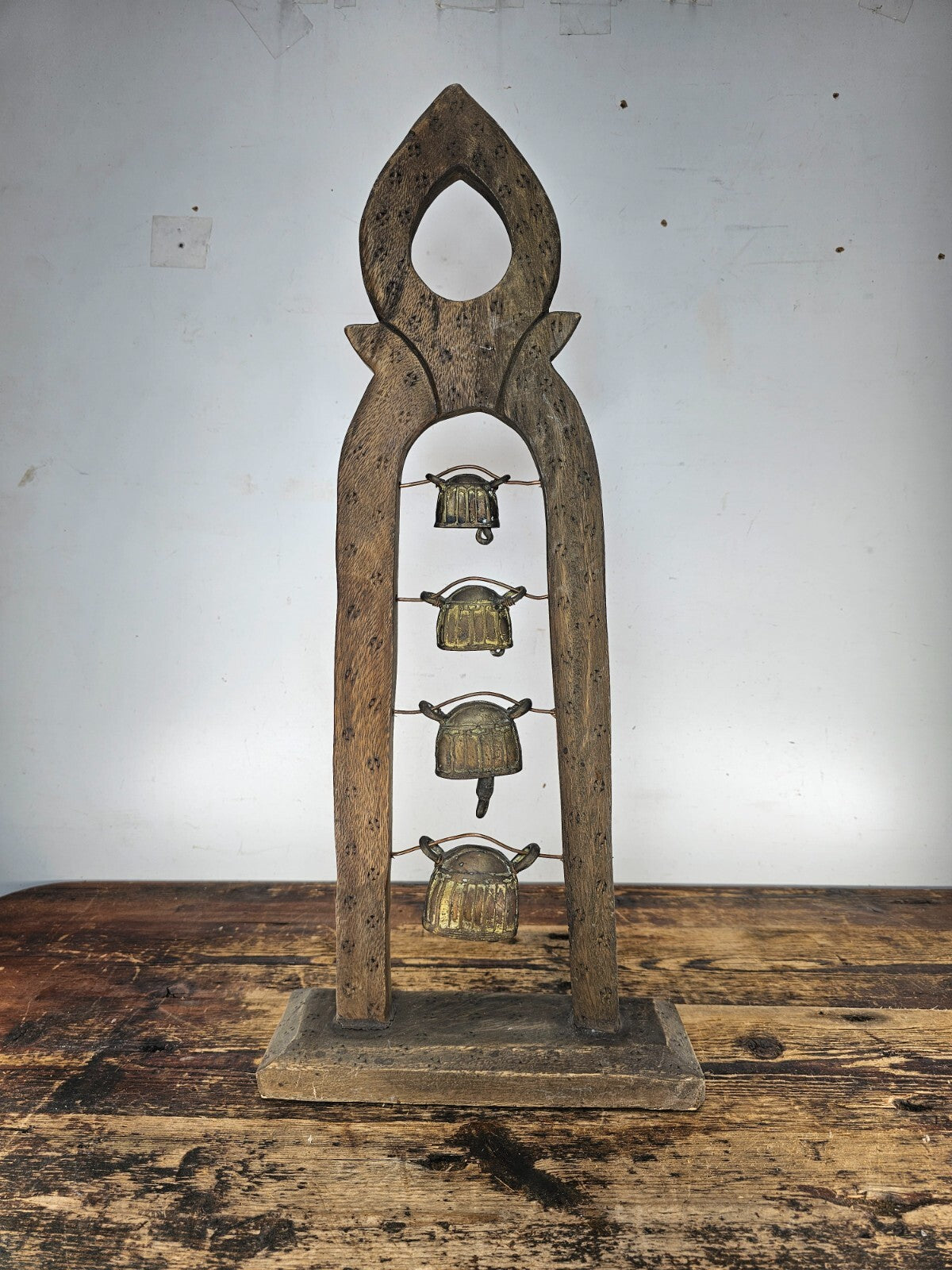 Four Burmese Hka-Lauk Water Buffalo Bells on Wooden Stand 23"H