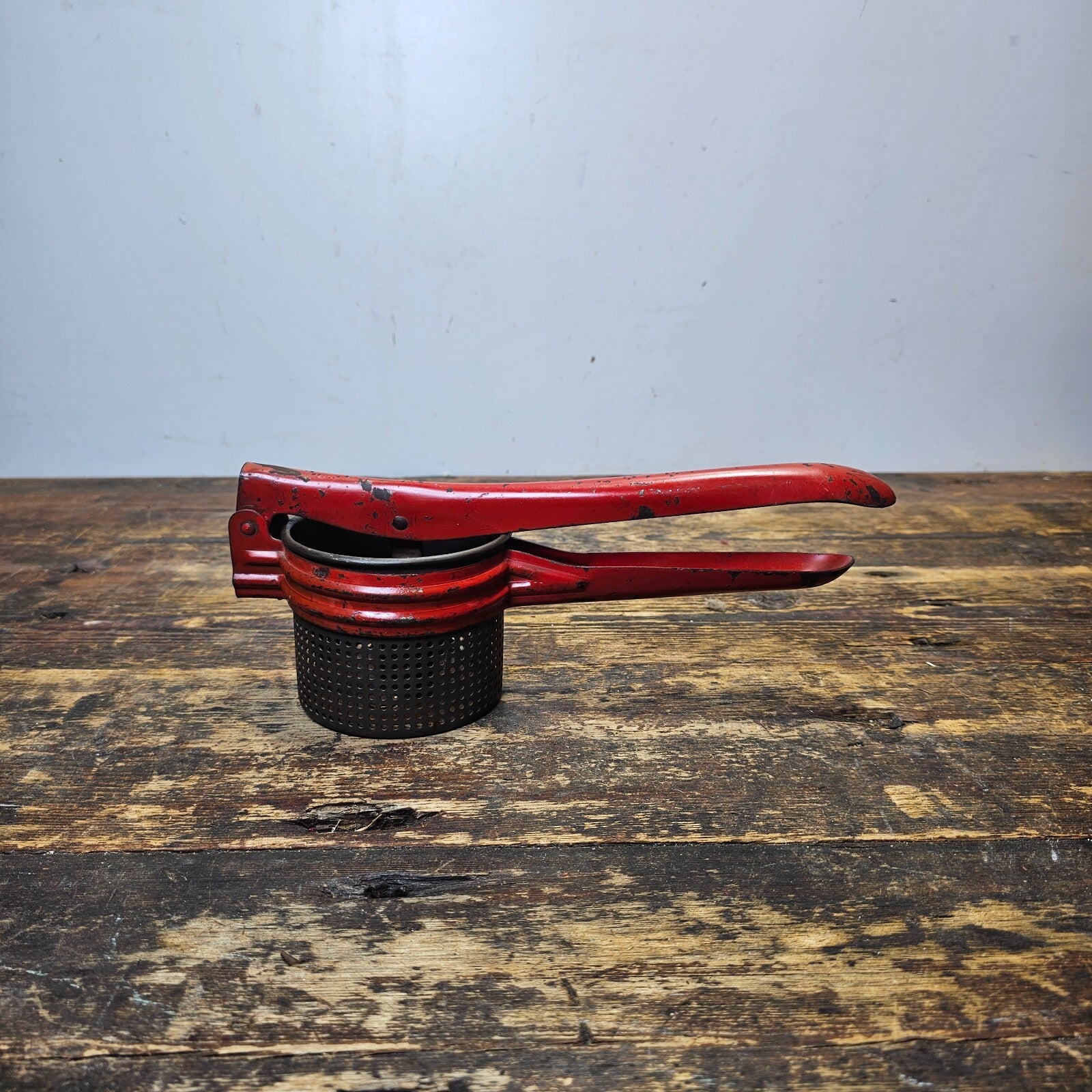 Vintage Red Metal Handle Potato Masher