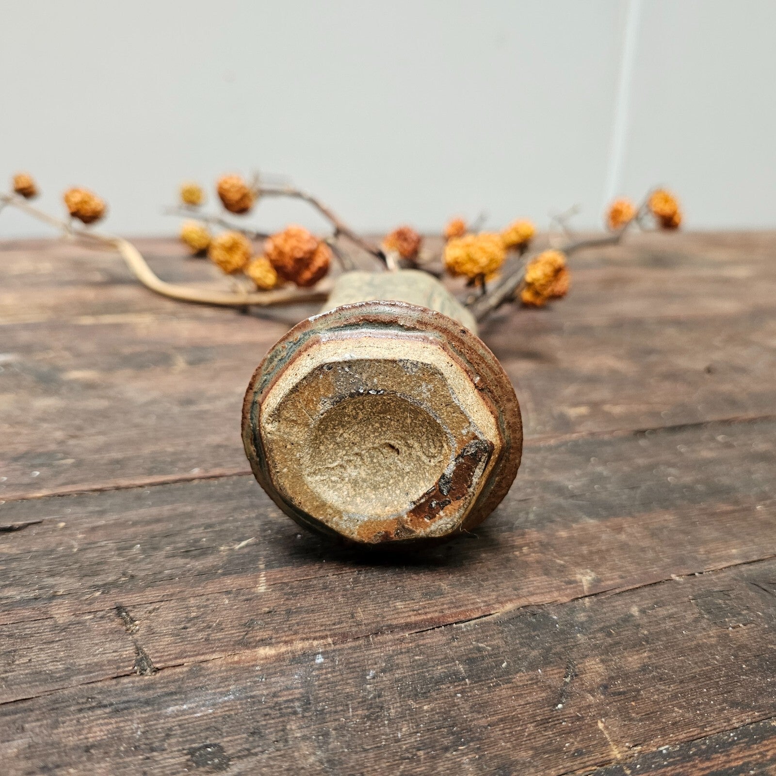 Dried Pumpkins On Sticks In A Singed Vase Asian Style Decoration
