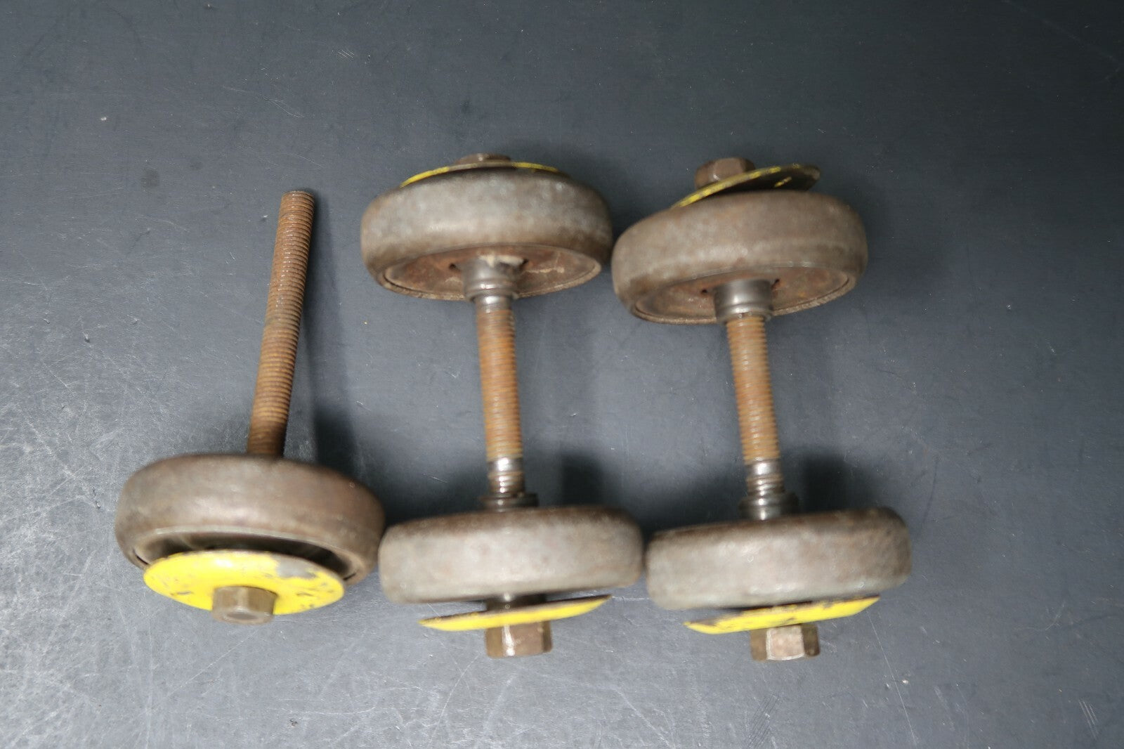 Lot of 5  Vintage Iron Ball Bearing Casters Wheels With Yellow Wheel Covers