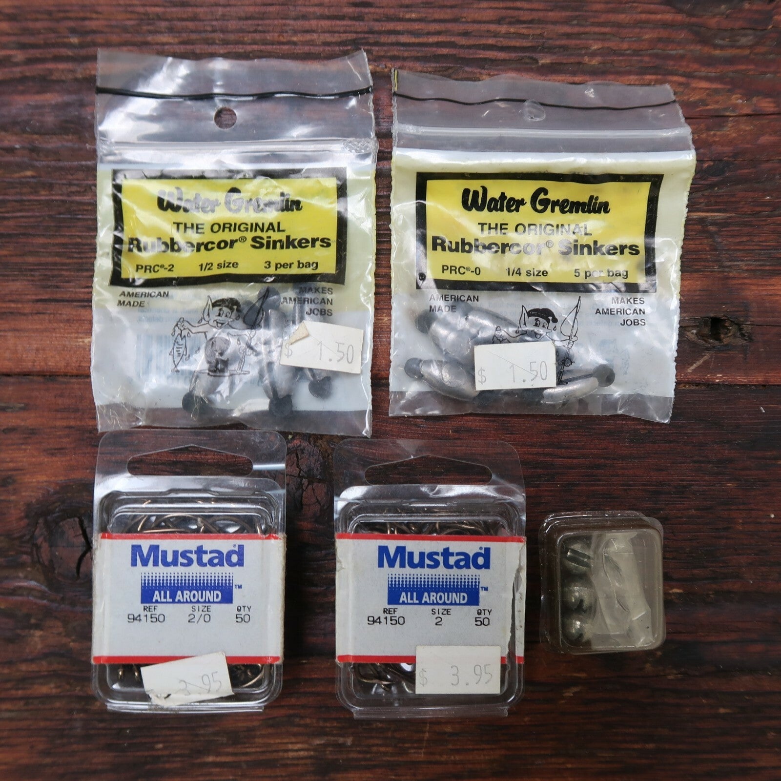 Set of 4 bags Gremlin Rubbercor Sinkers x 2, Mustad Hooks x 2