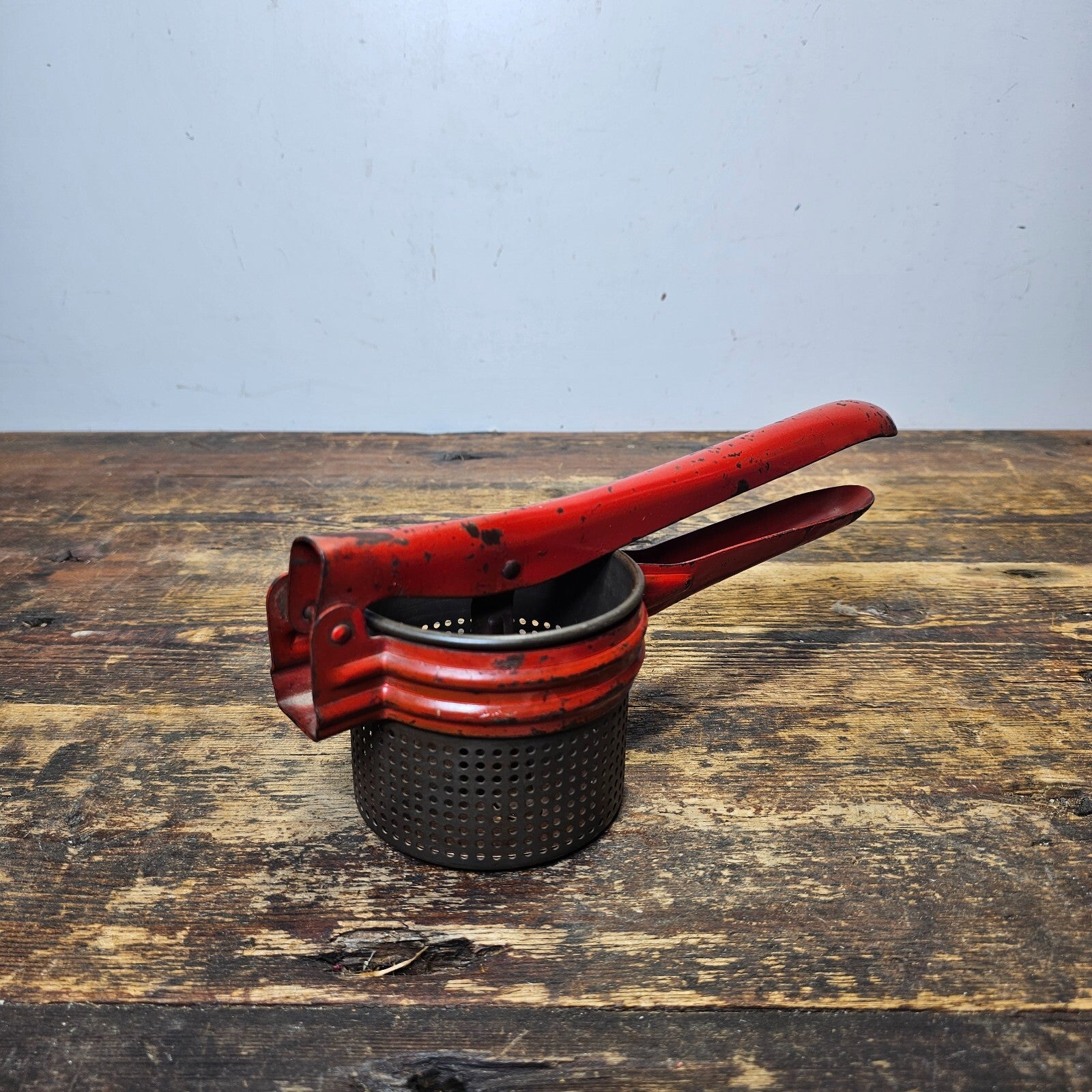 Vintage Red Metal Handle Potato Masher