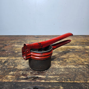 Vintage Red Metal Handle Potato Masher