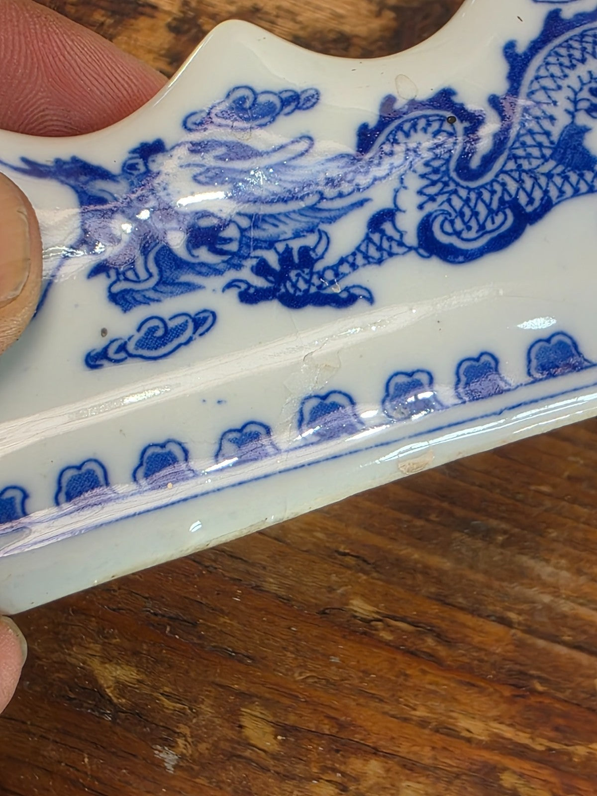 Blue and White Porcelain Brush Rest with Dragon Design