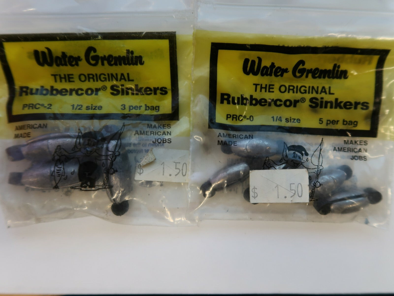 Set of 4 bags Gremlin Rubbercor Sinkers x 2, Mustad Hooks x 2