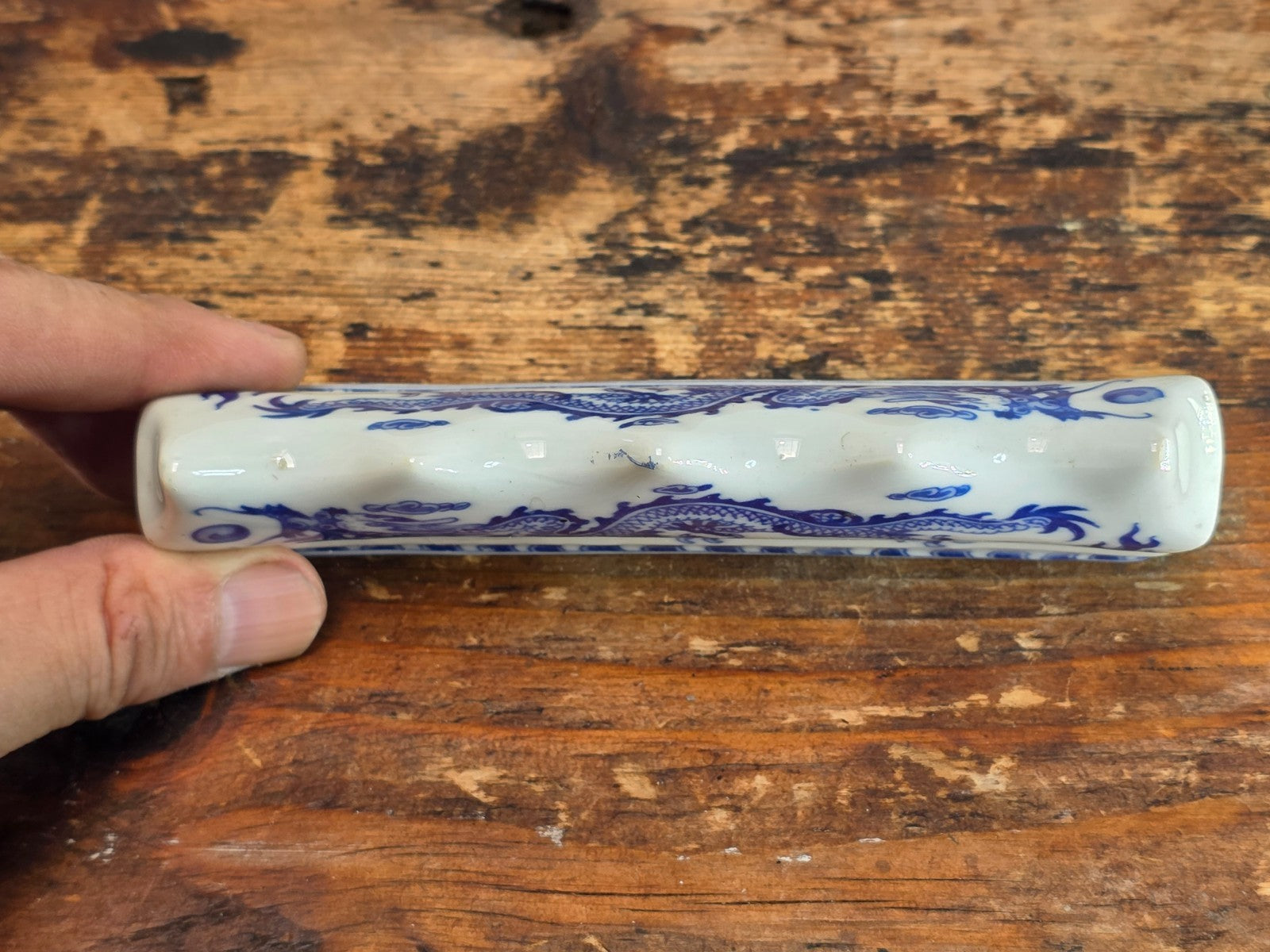 Blue and White Porcelain Brush Rest with Dragon Design