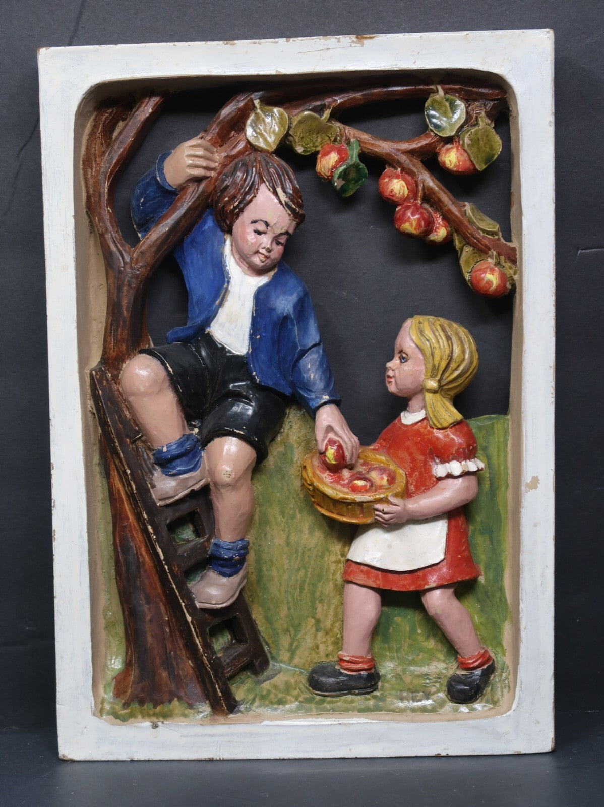 Brother and Sister Gathering Apples Faux Wood Framed Art