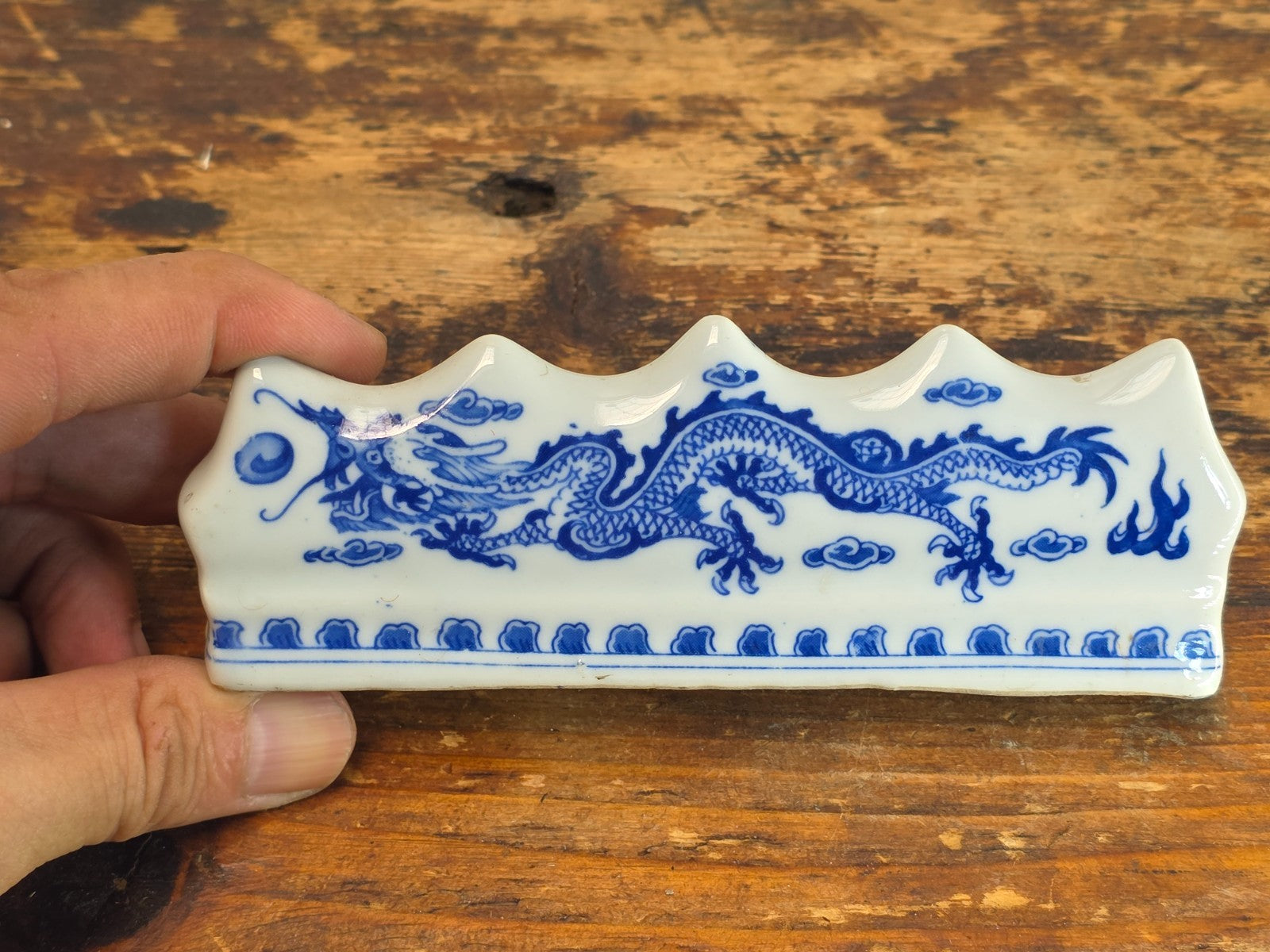 Blue and White Porcelain Brush Rest with Dragon Design