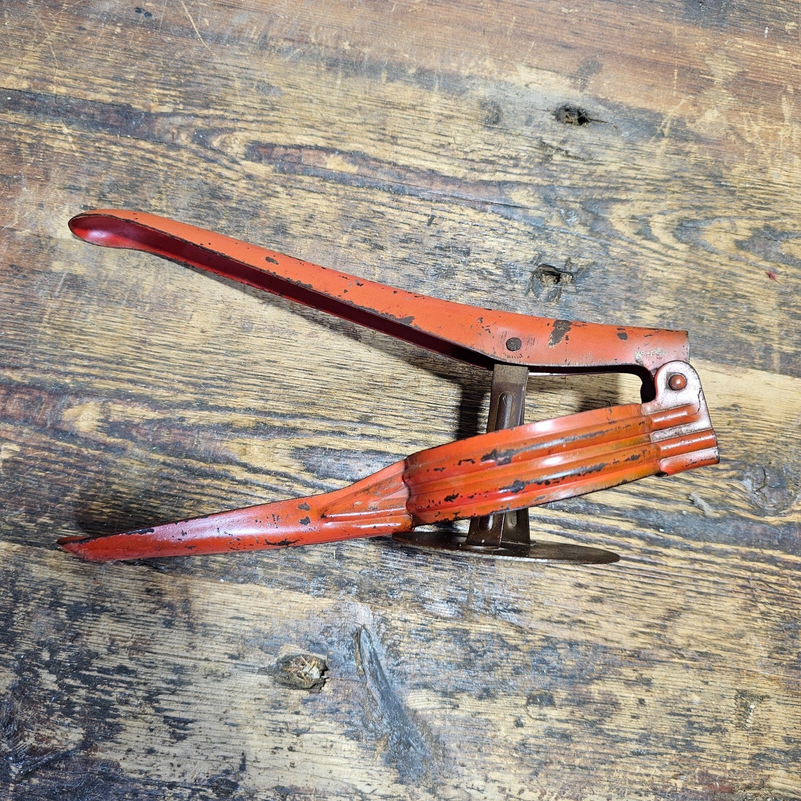 Vintage Red Metal Handle Potato Masher