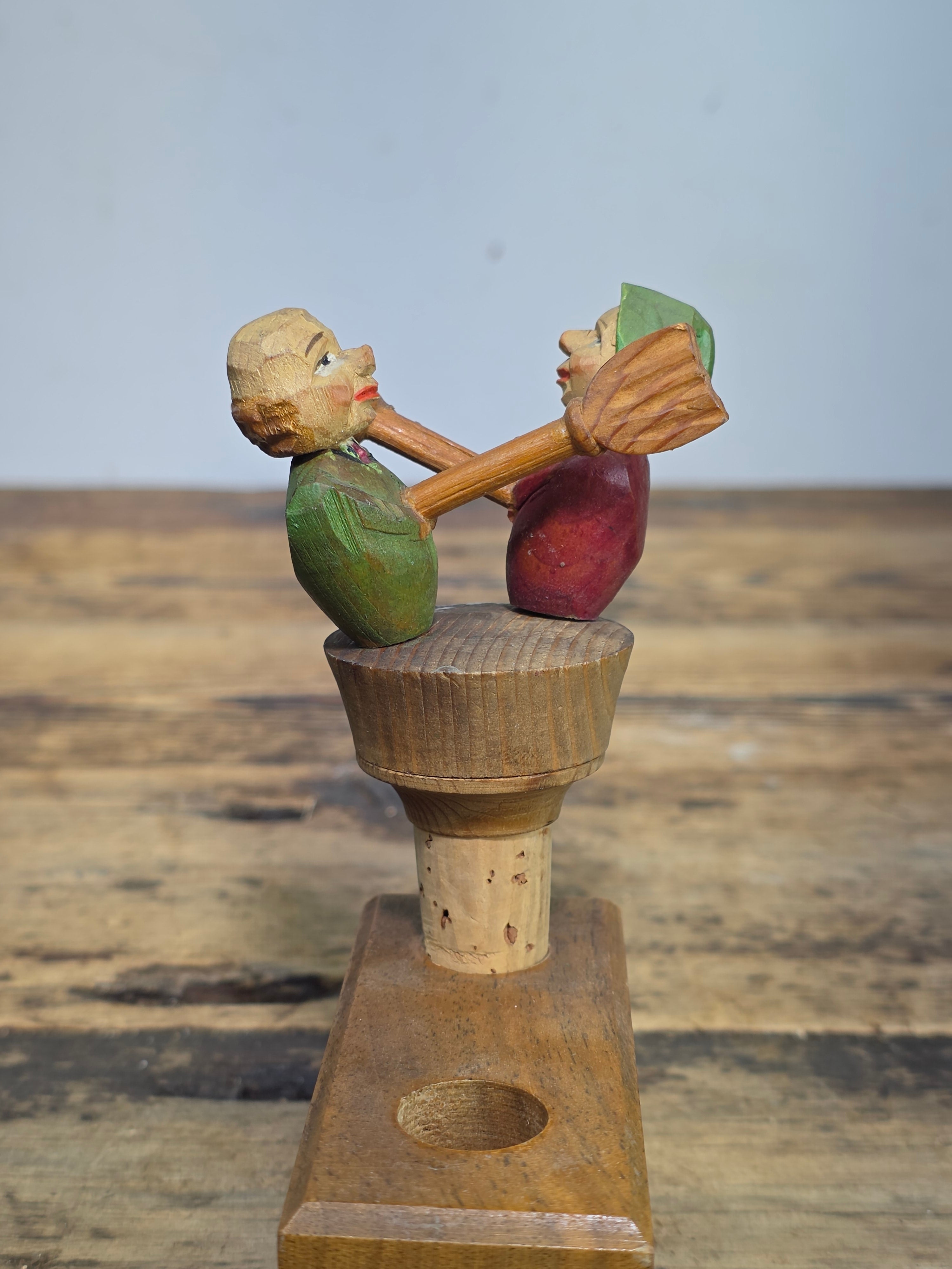 Vintage ANRI Wood Carved Mechanical Bottle Stopper Fighting Couple Brooms