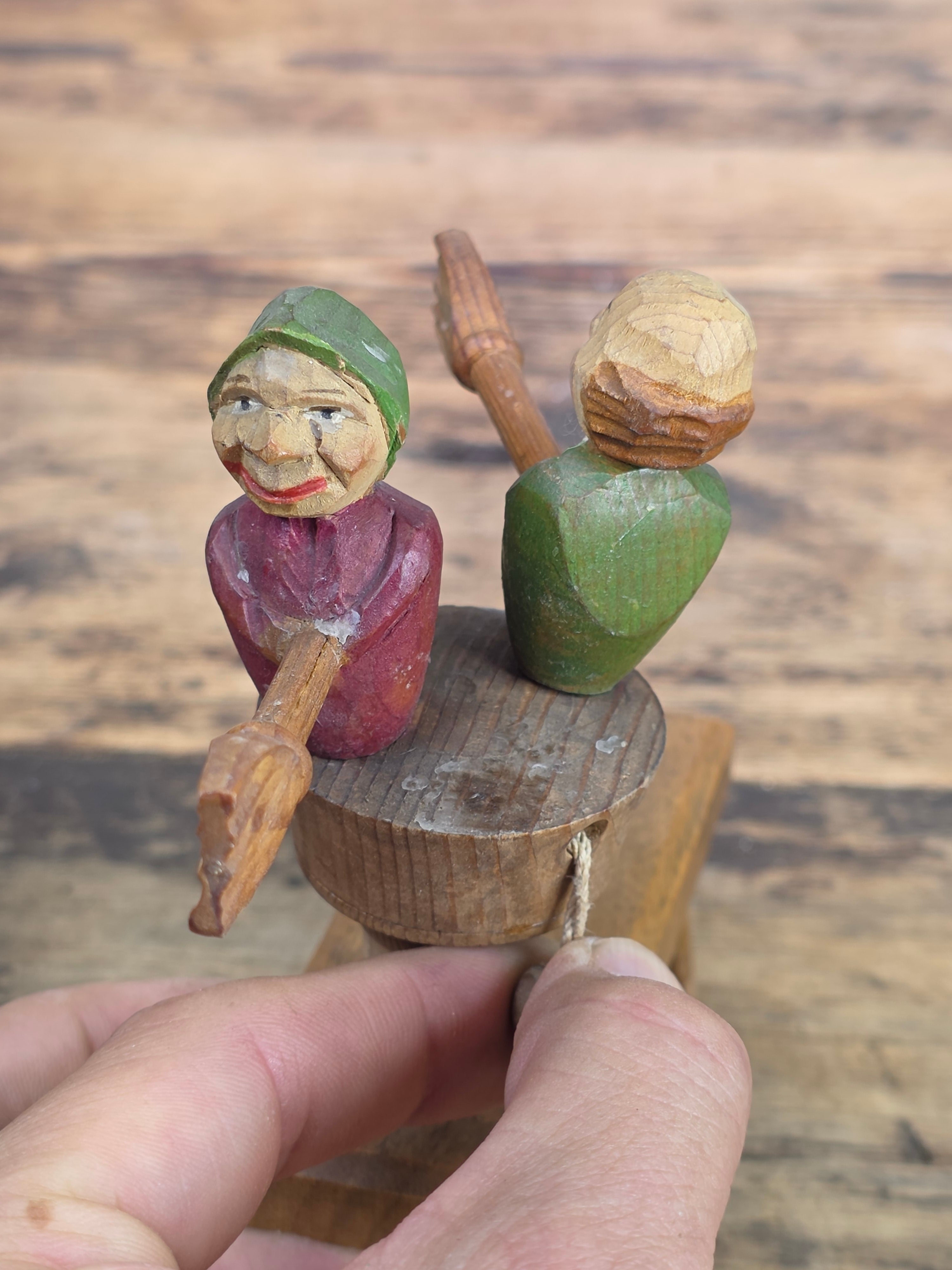 Vintage ANRI Wood Carved Mechanical Bottle Stopper Fighting Couple Brooms