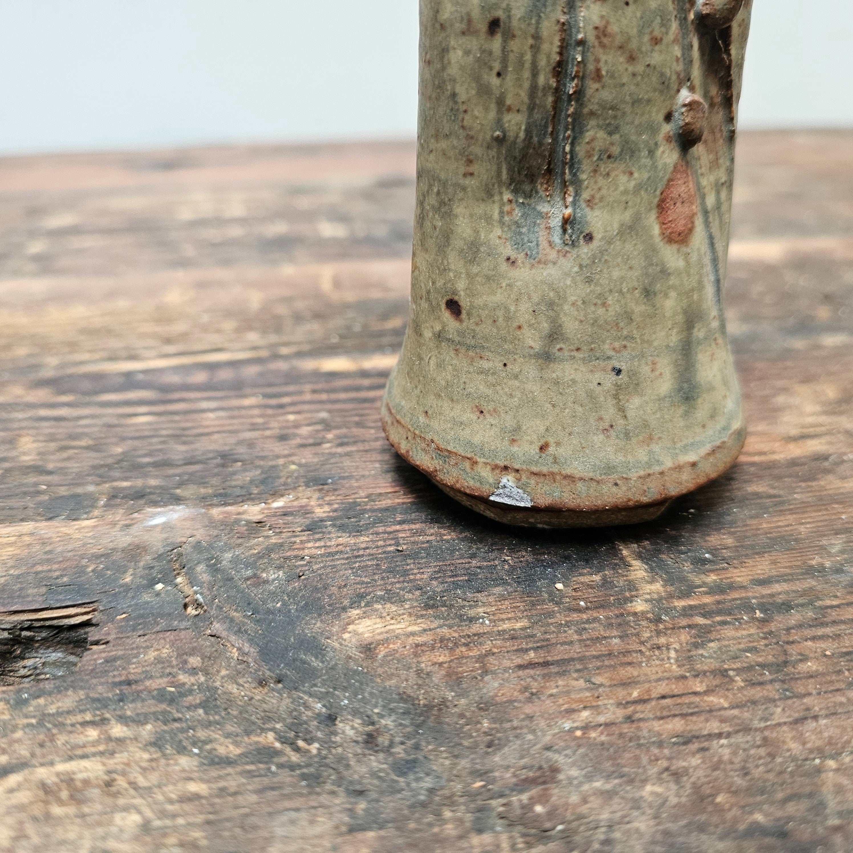 Dried Pumpkins On Sticks In A Singed Vase Asian Style Decoration