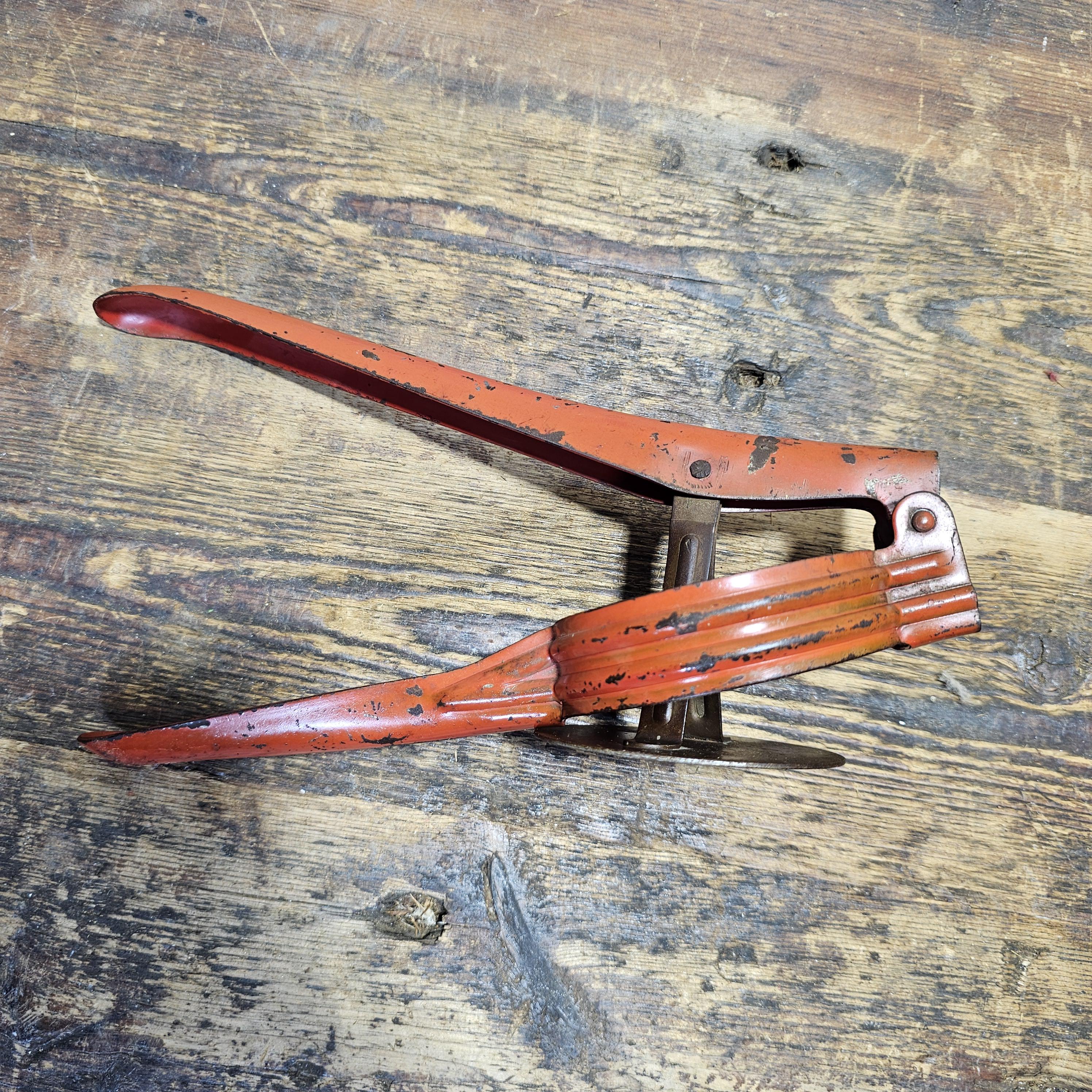 Vintage Red Metal Handle Potato Masher