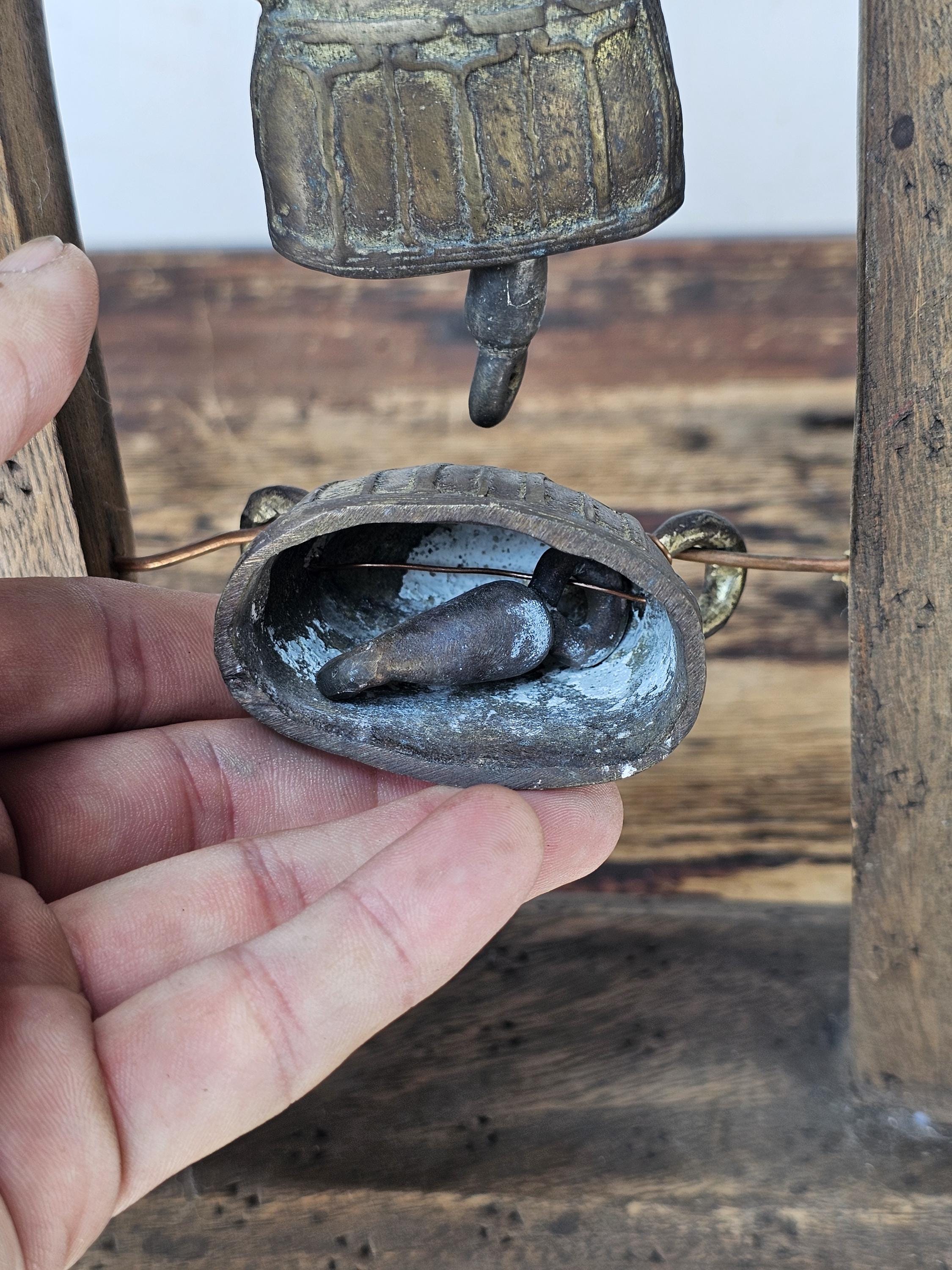 Four Burmese Hka-Lauk Water Buffalo Bells on Wooden Stand 23"H
