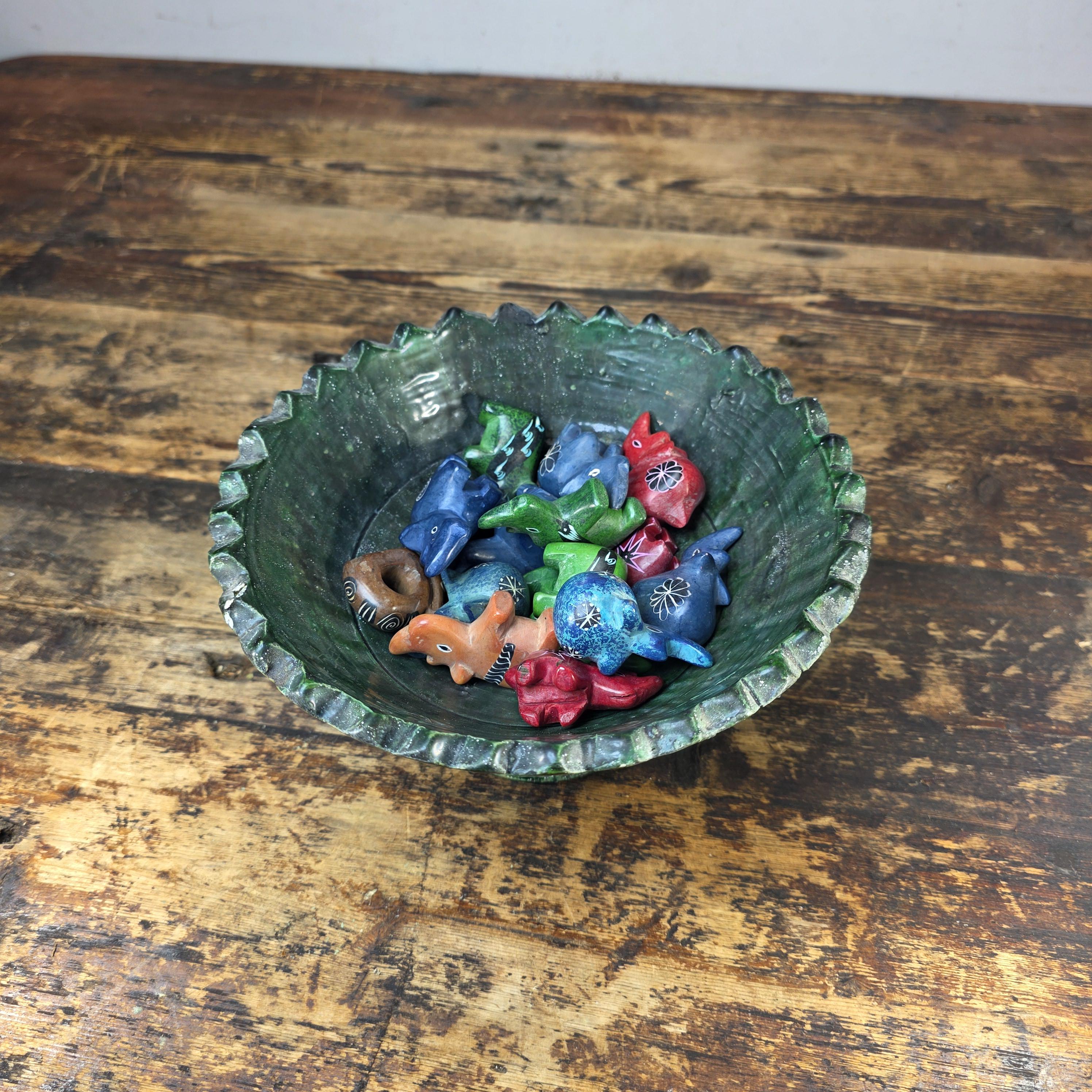 Tamegroute Green Pedestal Bowl with 15 African Soapstone Rhino Figurines